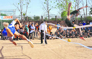 Players in action during a match between Manipur and Delhi in the 15th Sub-Junior Sepak Takraw Championship at Mount Carmel School, Sector 47, in Chandigarh on Wednesday.