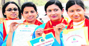 Winners show gold medals and certificates during their convocation at Uttarakhand Sanskrit University in Haridwar on Thursday. 