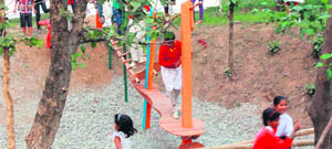 Swings prepared by international students for schoolchildren at Nanhi Dunya School at Vikasnagar on Thursday.