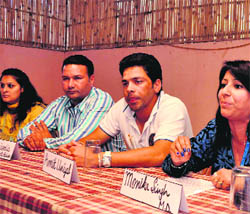 Monika Singh, Managing Director of the Global Sports Management company, addresses a press conference in Dehradun on Thursday. 