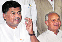 AICC general secretary BK Hariprasad (left) stresses a point at a press conference in Chandigarh on Thursday