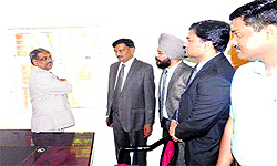 Justice Augustine George Masih discusses some points with (from right) DC J Ganesan, CJM Harish Gupta, SDM Prabhjot Singh and District and Sessions Judge Subhash Goyal at Rania in Sirsa on Thursday
