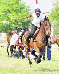 A participant during the World Equestrian Tent Pegging Championship, 2013, at Tau Davi Lal Stadium in Gurgaon