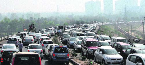 A view of a traffic jam on Gurgaaon-Faridabad highway near Gurgaon.