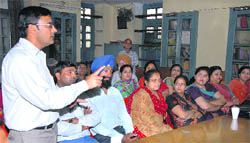 Teachers of government-aided schools hold a meeting at Swami Sant Dass School in Jalandhar on Thursday. 