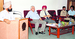 Prof AS Brar (L), GNDU Vice-Chancellor, speaks during the workshop at Guru Ramdas School of Planning in Amritsar on Friday