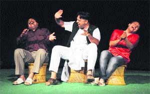 A scene from the play Jinne Jhalle Mere Palle being enacted at Balwant Gargi open-air theatre in Rose Garden, Bathinda, on Friday evening. 