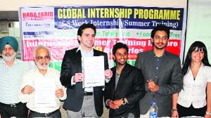 Managing director of the BFGI, Gurmit Singh Dhaliwal (second from left) and members of the students organisation, AIESEC, during a press conference on Friday. 