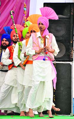 Students take part in a cultural event at the annual function of the Regional Group of Colleges, Behman Diwana