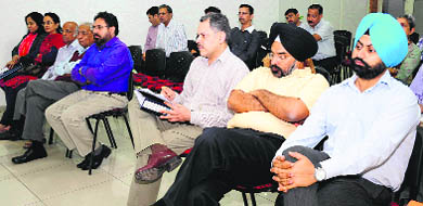 Principals of private unaided schools take part in a meeting on filling vacant seats under the RTE Act at Vivek HIgh School, Sector 38, Chandigarh, on Friday. 