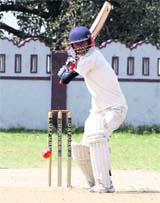 A batsman plays a shot during a match in the 61st Dehradun District Cricket League in Dehradun on Friday