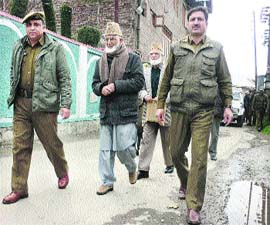 Hardline Hurriyat chief Syed Geelani being taken away by the police in Srinagar on Friday. 