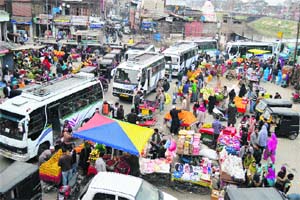 A heavy rush of vehicles and people was witnessed in Srinagar on Friday. 