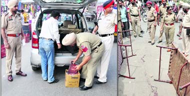 Police personnel check vehicles; and (right) ADCP-I Nilambari Jagdale inspect the spot where the manager of Shingaar Cinema was shot at in Ludhiana on Friday.