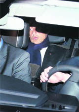 Former French President Nicolas Sarkozy leaves the Bordeaux courthouse on Thursday after a hearing. 