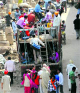 Putting their lives in danger, devotees engage goods carrier from Amritsar to visit Wadhbagh Singh Dera in Anandpur Sahib on the occasion of Holla Mohalla.