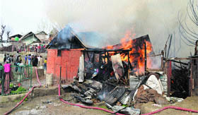  A massive fire damaged 13 residences at Tujgari Mohalla of Sheikh Colony in the old city in Srinagar on Saturday. Fire broke out at the residence of Abdul Rahim Sheikh, a police spokesman said. He added that fire engulfed 12 adjacent residential huts.
