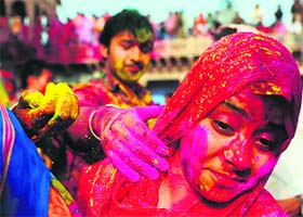 The Lathmar Holi festival at Nandji Temple in Nandgaon on Friday
