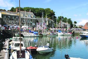 Padstows picturesque harbour is the pivot around which the whole town revolves