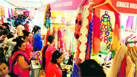Visitors throng the summer exhibition in Amritsar on Sunday.