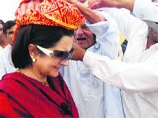 Haryana Public Health Engineering and Excise and Taxation Minister Kiran Choudhry is being honoured at the inauguration function of a water-boosting station in Bhiwani.