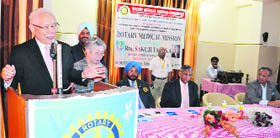 Rotary International president Sakuji Tanaka addresses a gathering at the medical camp in Udhampur on Sunday.