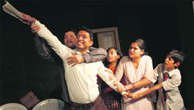 A scene from the play Hawa Hawai directed by Sumeet Sharma presented at the Natrang Studio Theatre in Jammu on Sunday.