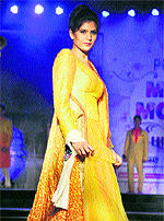 Models walk the ramp during a fashion show held in Jalandhar on Saturday