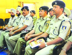CRPF personnel get tips on stress management at a camp in Hallo Majra, Chandigarh, on Monday. Tribune photo: S Chandan