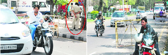 Helmet-less riding goes unchecked during a naka on the road separating Sectors 5 and 10 in Panchkula; and (below) not even a single policeman is seen at one of the entry points to Chandigarh. Tribune photos: Nitin Mittal