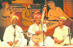 Mahesha Ram performs during the 6th Annual Kabir Festival with his group members at Tagore Theatre on Monday. Tribune photo: Pradeep Tewari