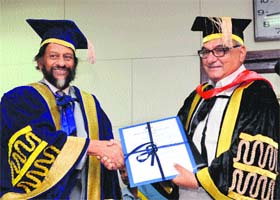 Dr RK Pachauri, TERI University Chancellor, confers an honorary degree of doctorate on the Chief Minister in Delhi on Monday