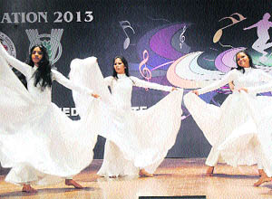 Participants perform during the All-India Inter-University Youth Festival Reverie Rejuvenation 2013 at the National Dairy Research Institute in Karnal. 