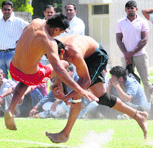 A kabaddi match in progress during the district-level panchayat games competition at the Karan Stadium in Karnal. 