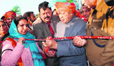 Chief Minister Virbhadra Singh inaugurates an exhibition on Holi at Sujanpur on Monday.