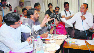 Leader of Opposition in Jalandhar MC Jagdish Raja argues with the Mayor Sunil Jyoti on the issue of property tax
