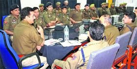 DIG Shakeel Beig addresses a meeting of SSPs, SPs and SDPOs, at Police Control Room, Jammu on Monday.