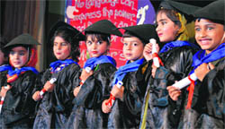 Students of Ryan International School hold their degrees during a graduation ceremony in Ludhiana on Monday.
