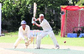 A man in action in a match in the 5th All-India Uttarakhand Cricket Cup-2013 played at Rangers College ground in Dehradun on Tuesday
