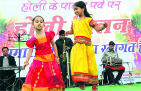 Bahugunas granddaughters dance during the function.