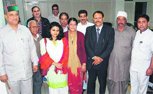 Congress nominee for KCC Bank Chairman Jagdish Sapiya with other Board of Director members before the meeting in Dharamsala on Tuesday. 