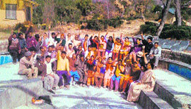 Local villagers being educated about policies and programmes of the government