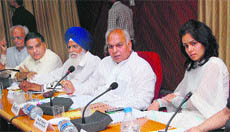 Member of Parliament Mahinder Singh Kaypee addresses a meeting of the Vigilance Monitoring Committtee in Jalandhar on Tuesday.