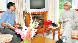 Governor NN Vohra with Jammu Deputy Commissioner AK Sahu in Jammu on Tuesday.