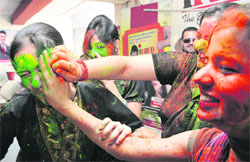 Students celebrate Holi in Jammu on Tuesday. Tribune photo: Inderjeet Singh