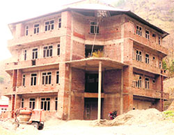 The under-construction Tehsil Complex of Mandi in Poonch. A tribune photograph