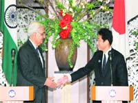 Foreign Minister Salman Khurshid with his Japanese counterpart Fumio Kishida after their joint press conference in Tokyo on Tuesday