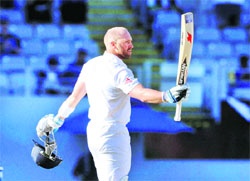 Matt Prior salutes the crowd after his century against New Zealand on the fifth day of the third Test at Eden Park in Auckland on Tuesday. 