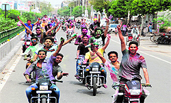 Revellers moving around the city on bikes was a common sight on Wednesday