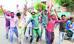 Youths celebrate the festival on the streets